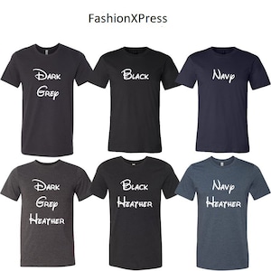 May include: Six t-shirts in different colors and styles. The t-shirts are all crew neck and short-sleeved. The colors are dark grey, black, navy, dark grey heather, black heather, and navy heather. The text on the t-shirts says "Dark Grey", "Black", "Navy", "Dark Grey Heather", "Black Heather", and "Navy Heather".