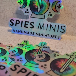 Spies Minis Merch: Holo Sticker