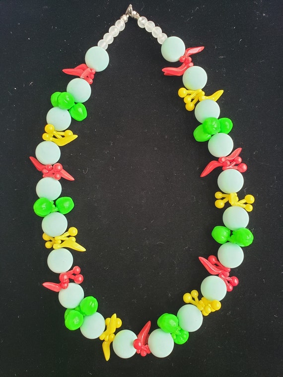 White beads, with Yellow, Red and Green Fruit bead