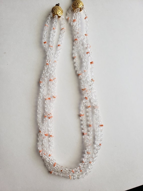 Four strand Crystal and coral bead Necklace