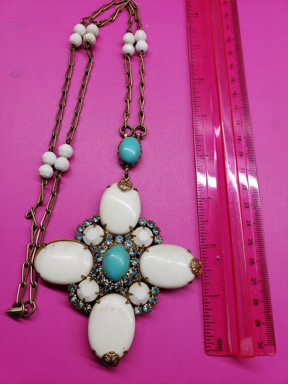 Signed Alice Caviness, white with blue gems pendan