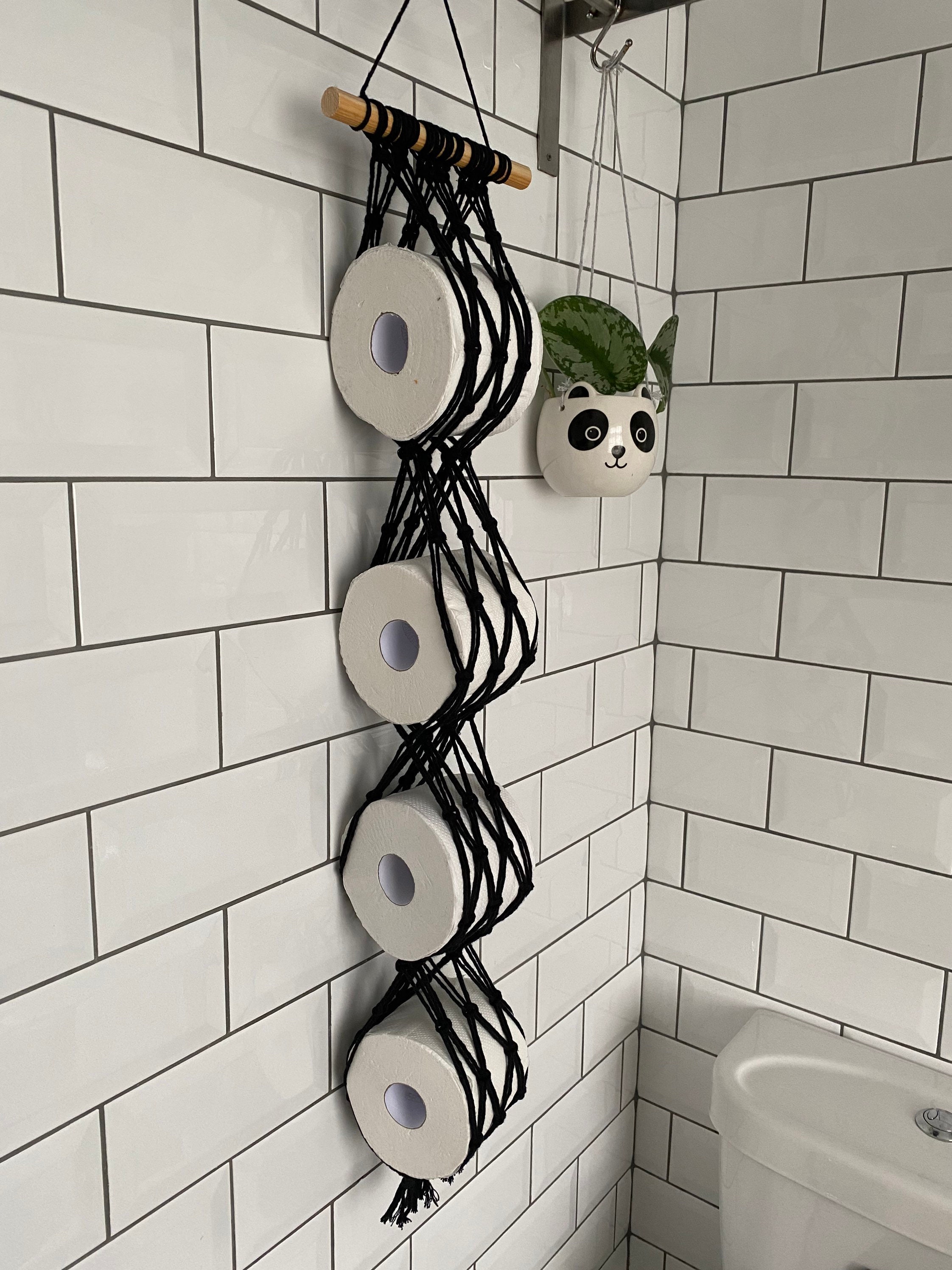 Range rouleau pour papier toilette en plastique noir marque Interdesign
