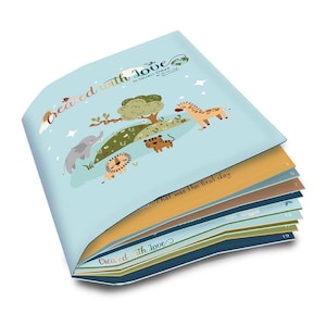 May include: A blue book with the title "Created with Love in Seven Days" and illustrations of animals. The book is open to reveal pages with numbers 5, 7, 13, and 19.