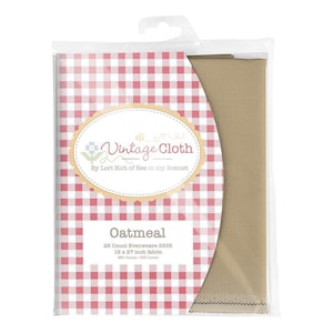 May include: A package of oatmeal-colored evenweave fabric for cross-stitch. The packaging features a red and white gingham pattern and the text "Vintage Cloth" with the brand name. The fabric measures 19 x 27 inches.