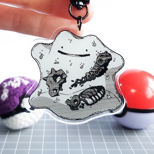 Ditto Anatomy - Llavero de bolsillo con dije acrílico