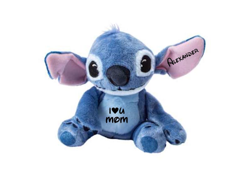 May include: A blue plush toy with large ears and black eyes. The text "I &hearts; U mom" is printed on the front. The name "Alexander" is printed on one ear. The toy is sitting on a white background.