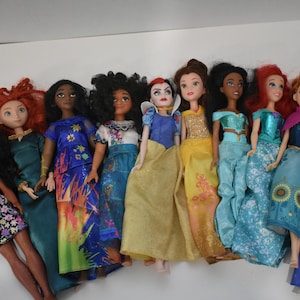 10 Disney Barbie doll assorted lot with play dolls Frozen, Ariel, Encanto, Brave, Moana image 1