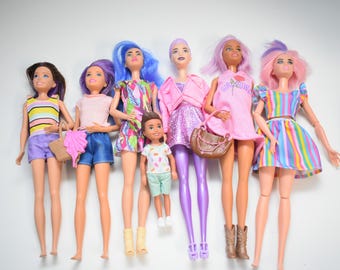 7 brunette and purple lot Mattel Barbie doll assorted lot