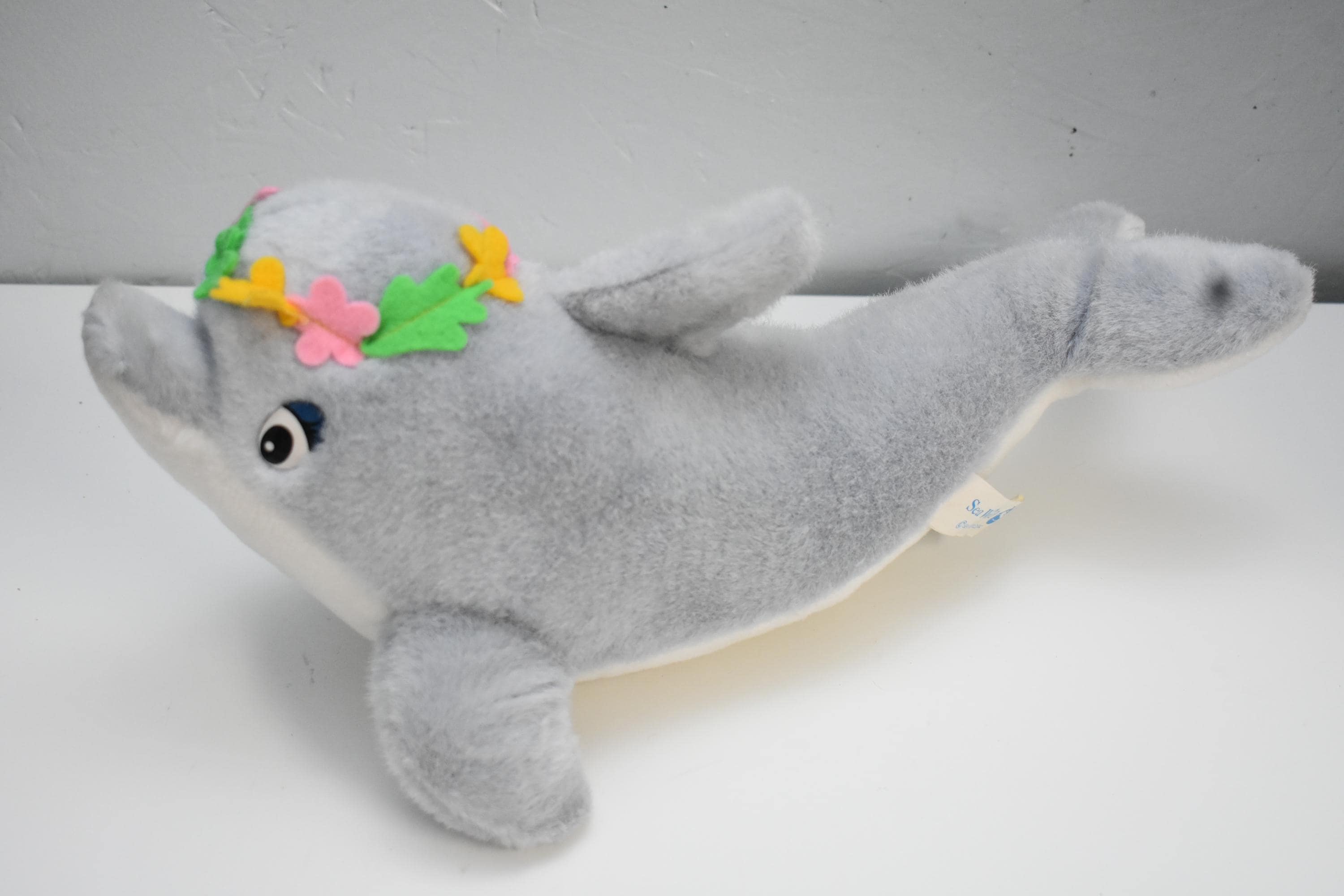 Sea World dolphin with flower garland vintage plush