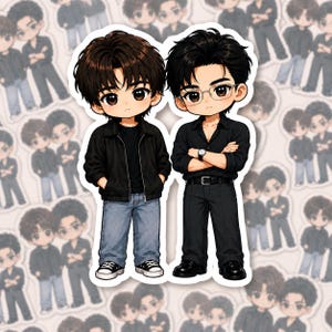May include: A sticker featuring two chibi-style characters standing side-by-side. The left character wears a black jacket, black shirt, blue jeans, and sneakers. The right character wears a black button-down shirt, black trousers, and glasses.