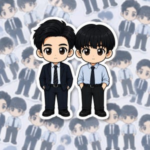 May include: A sticker featuring two cartoon characters with dark hair and large eyes. One character wears a dark suit with a striped tie, while the other wears a light blue button-down shirt with a dark tie and black trousers, set against a repeating pattern.