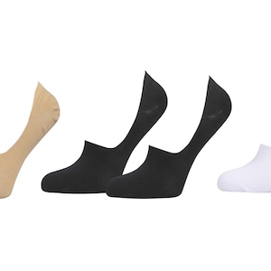 May include: A set of six pairs of no-show socks in beige, black, and white. The socks are made of a soft, breathable fabric and are designed to be worn with low-cut shoes.