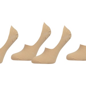 May include: Six pairs of nude no-show socks. The socks are made of a soft, breathable fabric and are designed to be worn with low-cut shoes.