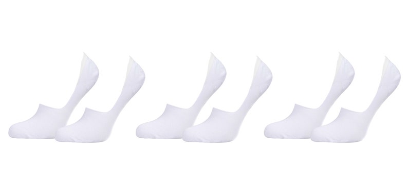 May include: Six pairs of white no-show socks. The socks are made of a soft, breathable fabric and are designed to be worn with low-cut shoes.