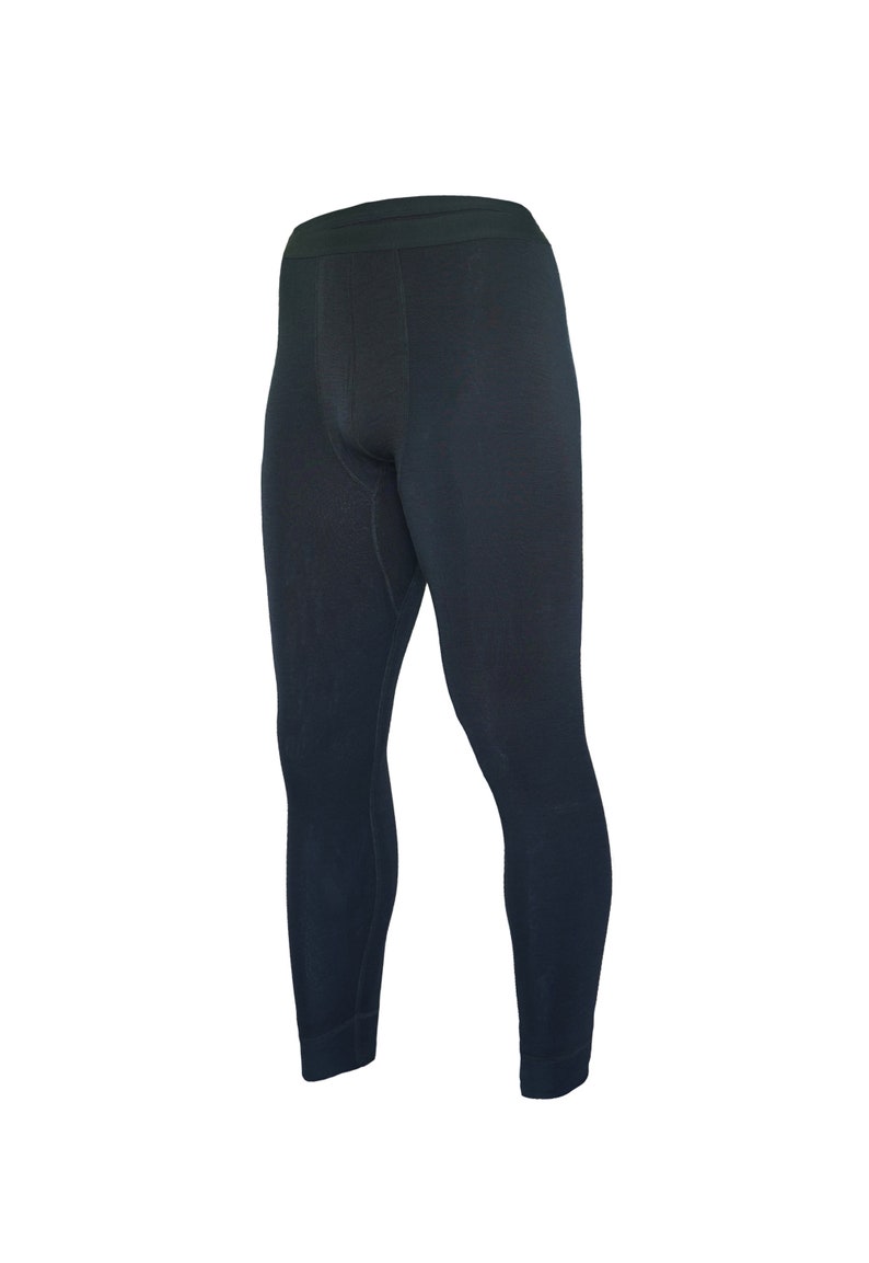 May include: Dark navy blue thermal leggings. These form-fitting base layer pants are designed for warmth and comfort. The leggings have a fitted waistband and are made of a soft, textured fabric. Perfect for cold weather activities.