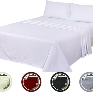 May include: White bed sheet set with two pillowcases. The sheet is smooth and wrinkle-free. The set is available in a range of colours.