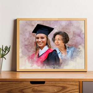 May include: A watercolor painting of a woman in a graduation cap and gown standing next to an older woman. The younger woman is smiling and the older woman is looking at the camera. The background is a soft purple and pink.