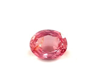 0.74 Carat Padparadscha Sapphire: Oval Orangish Pink Eye Clean Gemstone for Ring Jewelry