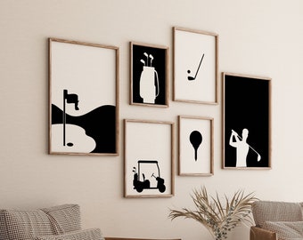 May include: A set of six black and white framed prints with golf-themed illustrations. The prints feature a golf cart, a golfer swinging a club, a golf bag with clubs, a golf ball, a golf tee, and a golf hole with a flag.