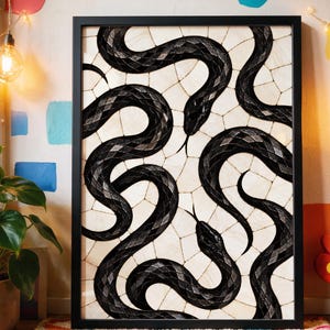May include: A framed rectangular wall art print featuring a black and white illustration of multiple intertwined snakes. The snakes have a textured, scale-like pattern on their bodies and are set against a background of irregular white cracked tiles.