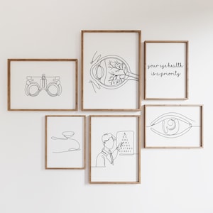 Peut inclure: Un ensemble de six impressions en noir et blanc en ligne d'art mettant en scène des images liées à l'œil. Les impressions comprennent un œil avec une coupe transversale, un tableau d'acuité visuelle, un outil d'examen des yeux, un œil stylisé et le texte "votre santé oculaire est une priorité".
