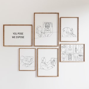 May include: A collection of six framed art prints with line drawings depicting medical imaging and anatomical studies. One print features the text "YOU POSE WE EXPOSE". The frames are a light brown color, and the background is white.