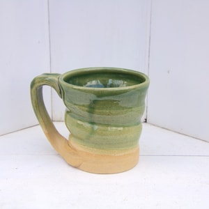 Handmade Ceramic Coffee Mug: Rustic Green Glaze, Rippled Pottery