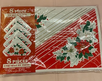 May include: An 8-piece Christmas-themed placemat set with a red and white striped design and a poinsettia floral pattern. The set includes 4 placemats and 4 coasters.