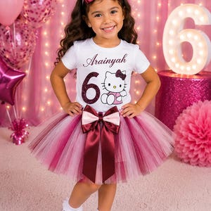 mini black dress near me Shadi in wears an XS Mik _tab1_womens-size-chart Size:EU32 Quinceanera Sweet Sixteen Birthday