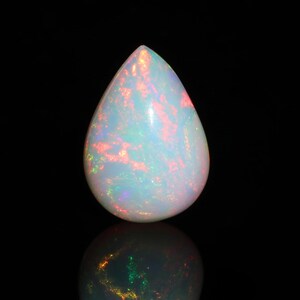 Welo Ethiopian Opal Pear Cabochon: 7.85 Ct Natural Gemstone, 13x19 mm