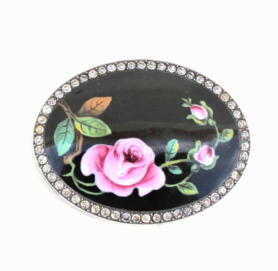Edwardian black enamel and cut paste floral roses brooch