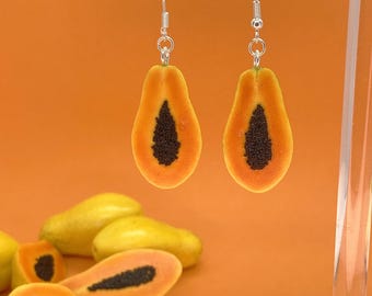 Orecchini di fico, papaya, cocco, melograno, carambola, arancia, limone
