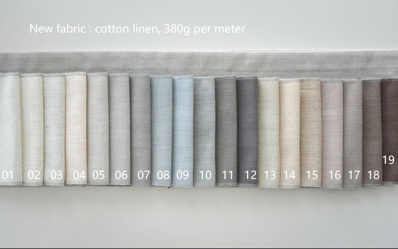May include: A swatch card displaying 19 different colours of cotton linen fabric. The fabric weighs 380 grams per metre. The swatches are numbered 01 to 19.
