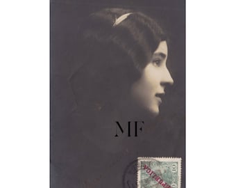 Vintage postcard, Portrait of a beautiful young woman