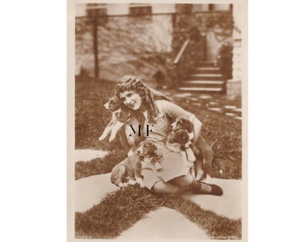 Vintage postcard, Mary Pickford with dogs