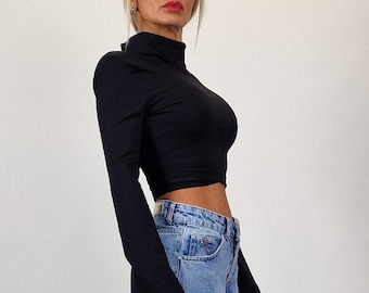 Black Turtleneck Top: Fitted Longsleeve Blouse with Bell Sleeve