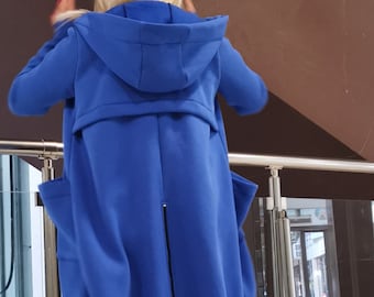 May include: A royal blue hooded sweatshirt with a long zipper down the back. The sweatshirt has large pockets on the sides and a relaxed fit.