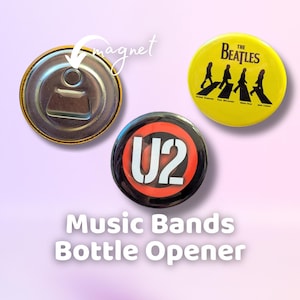 May include: A set of three round bottle opener magnets featuring the logos of popular music bands: The Beatles, U2, and a generic bottle opener. The Beatles magnet features a yellow background with a black silhouette of the band members walking across a crosswalk. The U2 magnet features a black background with a red circle and the band's name in white. The bottle opener magnet features a gold-coloured metal bottle opener with a magnetic backing.