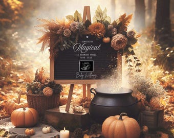 May include: A chalkboard sign with the text "Something Magical is brewing until June 2023" and a black and white ultrasound image. The sign is propped up on a wooden easel in a fall-themed setting with pumpkins, leaves, and a cauldron.