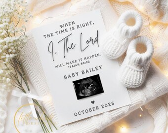 May include: A white announcement card with the text "When the time is right, I. The Lord will make it happen. Isaiah 60:22. Baby Bailey. October 2025" and a sonogram image. Two white knitted baby booties rest on a white blanket.