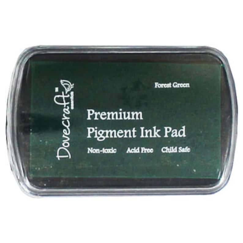 May include: A Dovecraft Premium Pigment Ink Pad in Forest Green. The ink pad is non-toxic, acid free, and child safe.