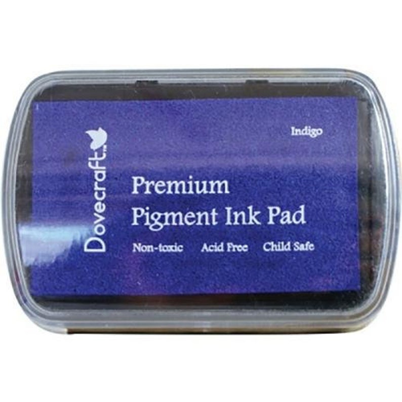 May include: A Dovecraft Premium Pigment Ink Pad in Indigo. The ink pad is non-toxic, acid free, and child safe.