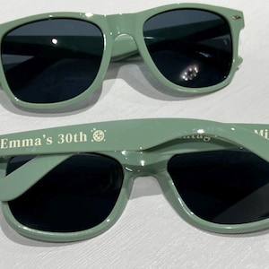 Green sunglasses personalized sunglasses wedding gifts for guests bulk events sunnies destination wedding favors sage green customized shades baby shower gifts baby blue sky blue sunnies travel cruise cancun beach sunglasses dark blue sunglasses hotel giveaway gifts company running campaign golf soccer football sunglasses class of 2026 graduation gifts university school leavers grad gifts birthday gifts light teal shades aqua quinceanera sunglasses beige printed sunglasses sports summer gifts