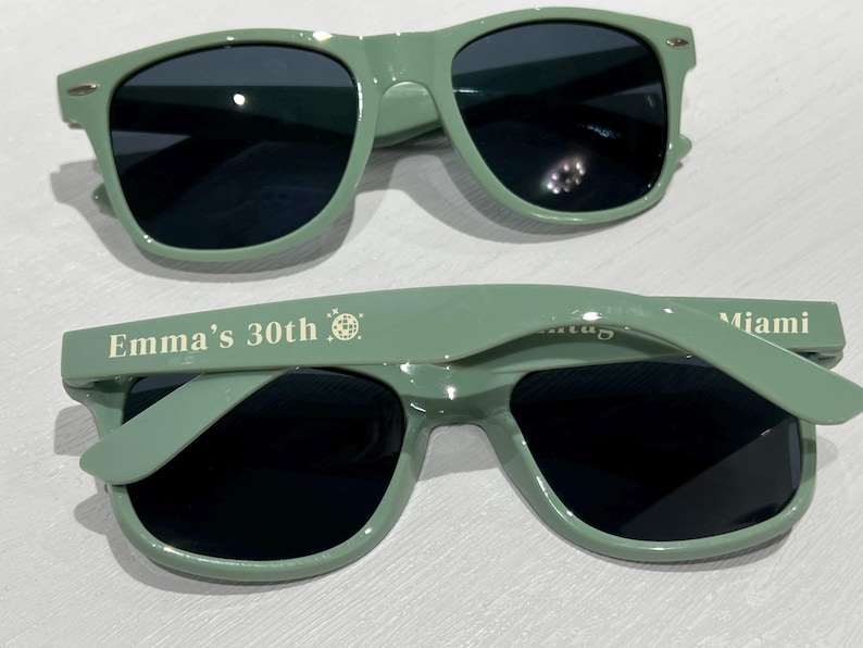 Green sunglasses personalized sunglasses wedding gifts for guests bulk events sunnies destination wedding favors sage green customized shades baby shower gifts baby blue sky blue sunnies travel cruise cancun beach sunglasses dark blue sunglasses hotel giveaway gifts company running campaign golf soccer football sunglasses class of 2026 graduation gifts university school leavers grad gifts birthday gifts light teal shades aqua quinceanera sunglasses beige printed sunglasses sports summer gifts