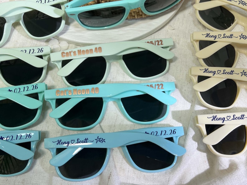 Blue sunglasses personalized sunglasses wedding gifts for guests bulk events sunnies destination wedding favors sage green customized shades baby shower gifts baby blue sky blue sunnies travel cruise cancun beach sunglasses dark blue sunglasses hotel giveaway gifts company running campaign golf soccer football sunglasses class of 2026 graduation gifts university school leavers grad gifts birthday gifts light teal shades aqua quinceanera sunglasses beige printed sunglasses sports summer gifts