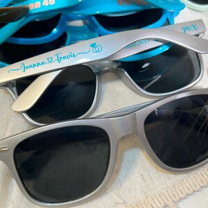 Blue sunglasses personalized sunglasses wedding gifts for guests bulk events sunnies destination wedding favors sage green customized shades baby shower gifts baby blue sky blue sunnies travel cruise cancun beach sunglasses dark blue sunglasses hotel giveaway gifts company running campaign golf soccer football sunglasses class of 2026 graduation gifts university school leavers grad gifts birthday gifts light teal shades aqua quinceanera sunglasses beige printed sunglasses sports summer gifts
