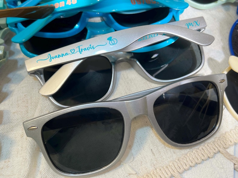 Blue sunglasses personalized sunglasses wedding gifts for guests bulk events sunnies destination wedding favors sage green customized shades baby shower gifts baby blue sky blue sunnies travel cruise cancun beach sunglasses dark blue sunglasses hotel giveaway gifts company running campaign golf soccer football sunglasses class of 2026 graduation gifts university school leavers grad gifts birthday gifts light teal shades aqua quinceanera sunglasses beige printed sunglasses sports summer gifts