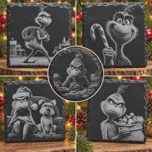 May include: A set of five black slate coasters featuring engraved illustrations of a green creature. The designs include the creature walking with a wreath, holding a candy cane, sitting with a dog, holding a sack of items, and a central circular portrait.