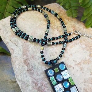 Contemporary glass and ceramic tile mosaic pendant in blues/greens. Wearable art, one of a kind jewelry, unique pendants