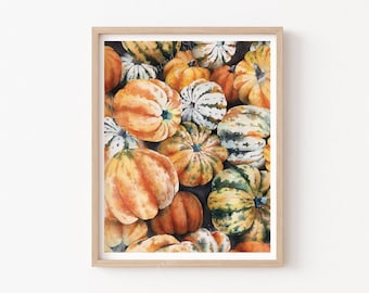 May include: A watercolor painting of a collection of gourds in various shades of orange, green, and white. The gourds are arranged in a close-up, overlapping pattern, creating a vibrant and textured composition.